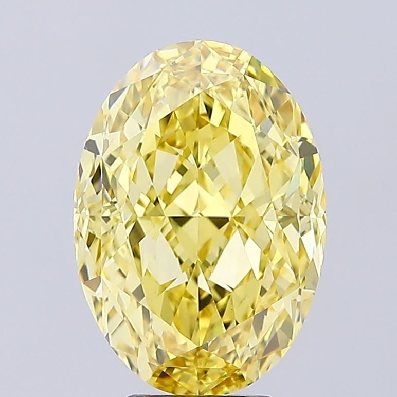 Loose Diamond - OVAL 7.15ct Fancy Vivid Yellow VS1: Loose Diamond - OVAL 7.15ct Fancy Vivid Yellow VS1 Source: This is a real non-mined Diamond that has been grown in a lab Shape: OVAL Carats: 7.15 Color: Fancy Vivid Yellow Certification: IGI Video: