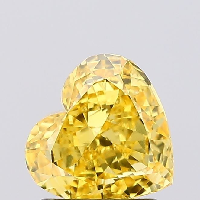 Loose Diamond - HEART 1.35ct Fancy Vivid Yellow VS1: Loose Diamond - HEART 1.35ct Fancy Vivid Yellow VS1 Source: This is a real non-mined Diamond that has been grown in a lab Shape: HEART Carats: 1.35 Color: Fancy Vivid Yellow Certification: IGI