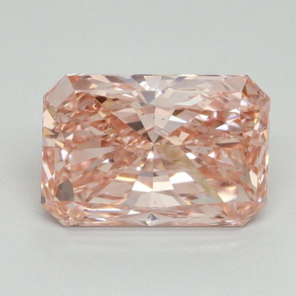 Loose Diamond - RADIANT 2.56ct Fancy Vivid Pink VS2: Loose Diamond - RADIANT 2.56ct Fancy Vivid Pink VS2 Source: This is a real non-mined Diamond that has been grown in a lab Shape: RADIANT Carats: 2.56 Color: Fancy Vivid Pink Certification: IGI Video: