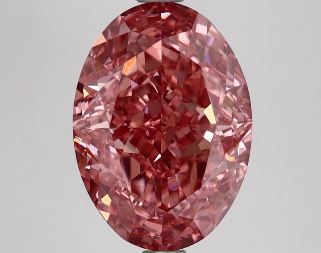 Loose Diamond - OVAL 4.21ct Fancy Vivid Pink VVS2: Loose Diamond - OVAL 4.21ct Fancy Vivid Pink VVS2 Source: This is a real non-mined Diamond that has been grown in a lab Shape: OVAL Carats: 4.21 Color: Fancy Vivid Pink Certification: IGI Video: