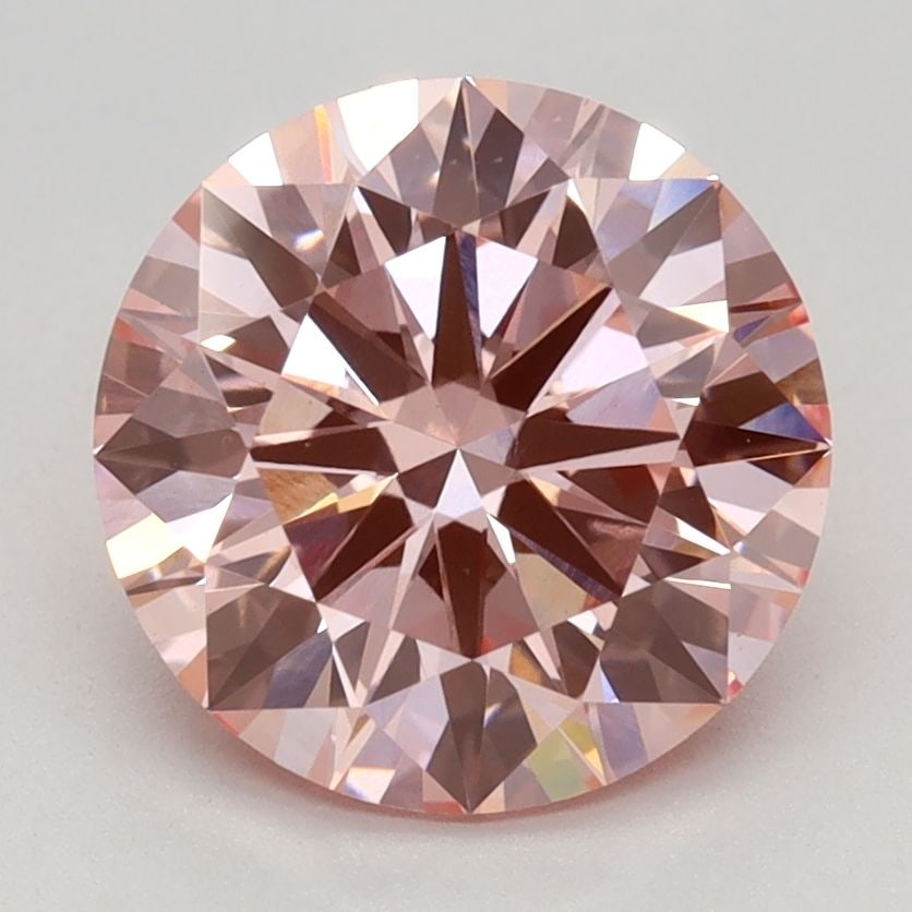Ideal Loose Diamond - ROUND 2.29ct Fancy Vivid Pink VS1: Ideal Loose Diamond - ROUND 2.29ct Fancy Vivid Pink VS1 Source: This is a real non-mined Diamond that has been grown in a lab Shape: ROUND Carats: 2.29 Color: Fancy Vivid Pink Certification: IGI Video