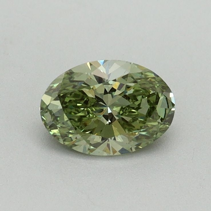 Loose Diamond - OVAL 0.52ct Fancy Vivid Green VVS2: Loose Diamond - OVAL 0.52ct Fancy Vivid Green VVS2 Source: This is a real non-mined Diamond that has been grown in a lab Shape: OVAL Carats: 0.52 Color: Fancy Vivid Green Certification: IGI Video: