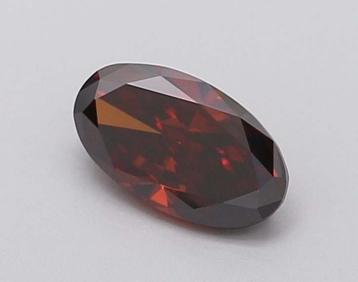 Loose Diamond - OVAL 0.83ct Fancy Deep Orange VS1: Loose Diamond - OVAL 0.83ct Fancy Deep Orange VS1 Source: This is a real non-mined Diamond that has been grown in a lab Shape: OVAL Carats: 0.83 Color: Fancy Deep Orange Certification: IGI Video: