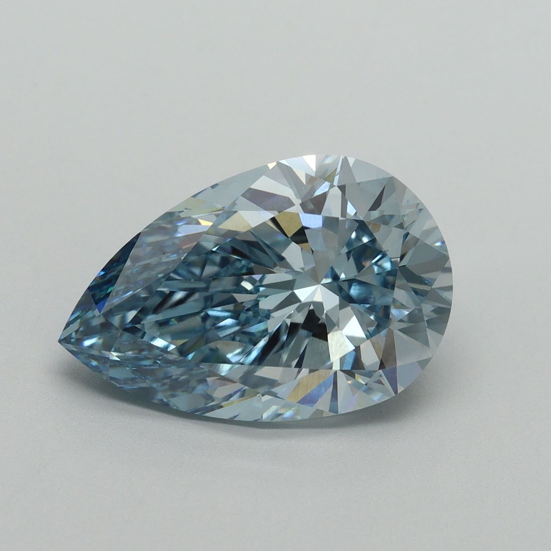 Loose Diamond - PEAR 5.49ct Fancy Vivid Blue VS2: Loose Diamond - PEAR 5.49ct Fancy Vivid Blue VS2 Source: This is a real non-mined Diamond that has been grown in a lab Shape: PEAR Carats: 5.49 Color: Fancy Vivid Blue Certification: IGI Video: