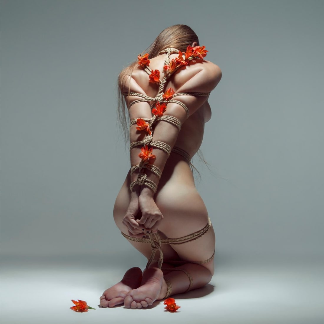 Edition 1/7 'Rebirth' Shibari Photography by Aaron McPolin 30 x 30 Inch: Edition 1/7 'Rebirth' Shibari Photography by Aaron McPolin 30 x 30 Inch "Rebirth" is a striking piece of Shibari photography by Aaron McPolin, capturing the essence of connection and trust through the