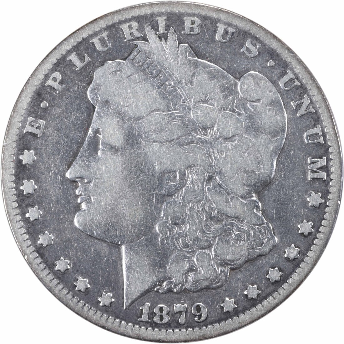 1879-CC Morgan Silver Dollar $1 by George T. Morgan: 1879-CC Morgan Silver Dollar $1 by George T. Morgan This 1879-CC Morgan Silver Dollar features a striking design by George T. Morgan. It is a circulated coin, displaying the wear typical of its age. T