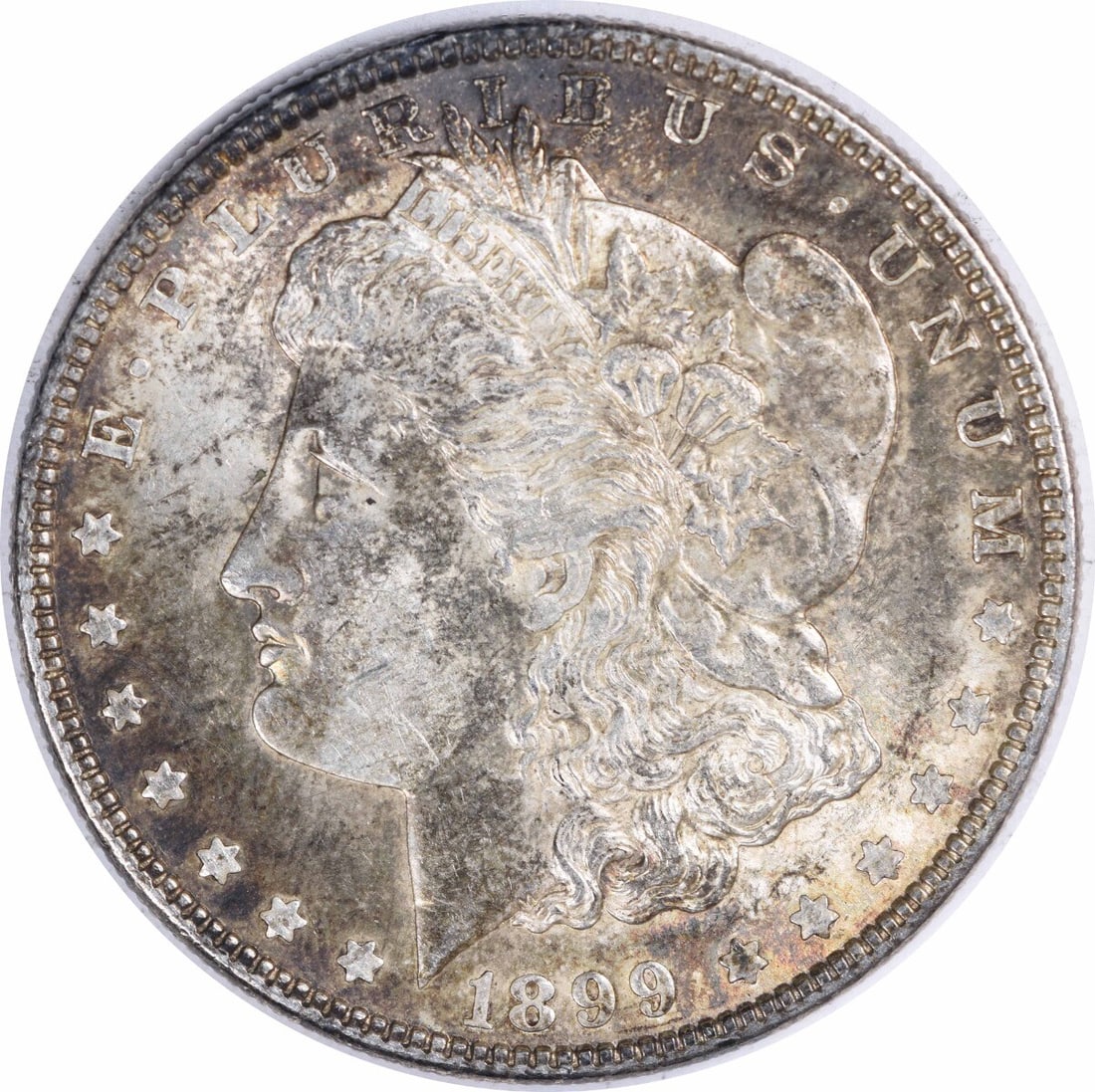 1899 Morgan Silver Dollar AU Uncertified Philadelphia Coin: 1899 Morgan Silver Dollar AU Uncertified Philadelphia Coin This 1899 Morgan Silver Dollar is an exceptional piece for collectors. Featuring a beautiful design by George T. Morgan, this coin is classif