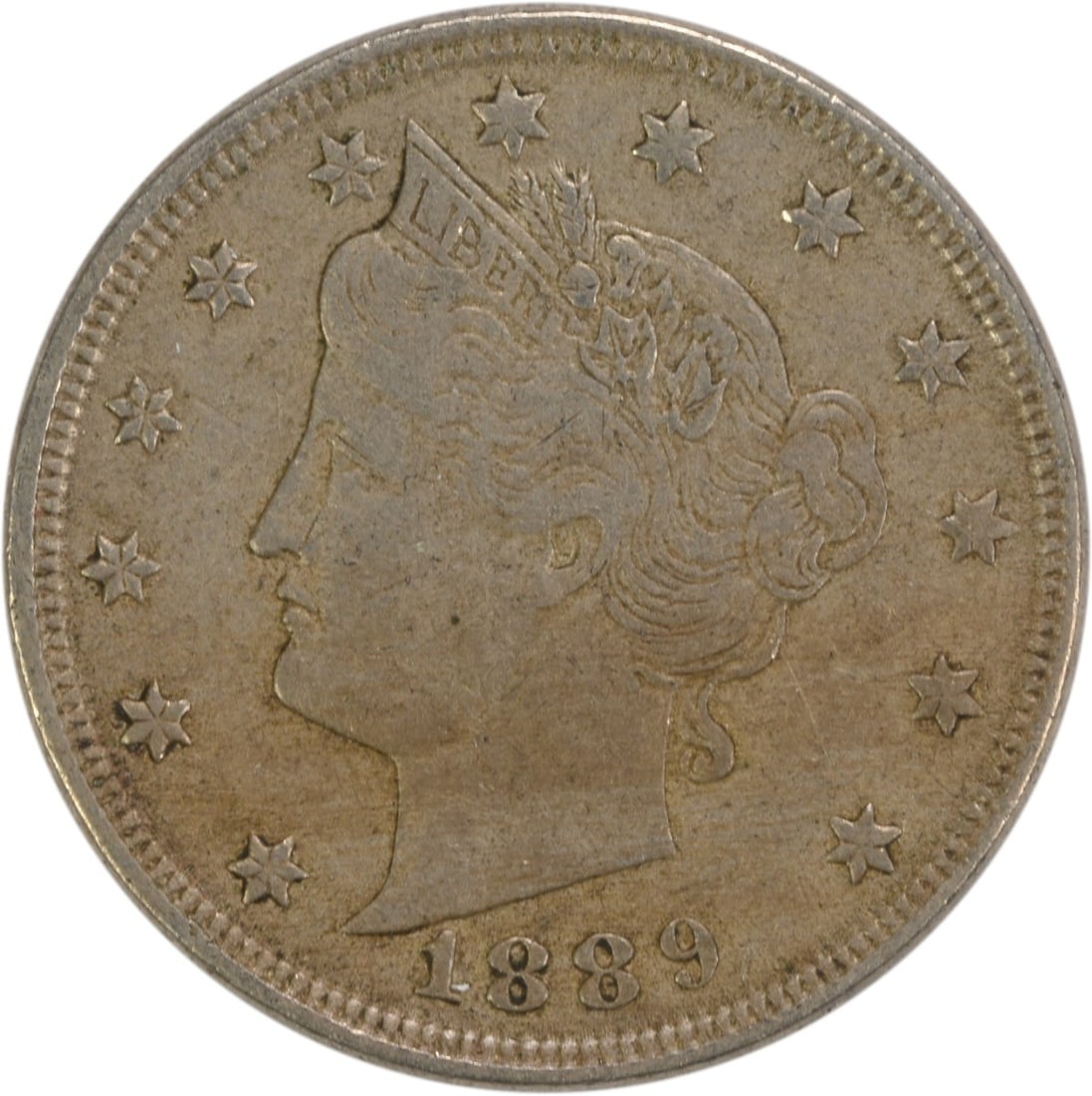 1889 Liberty Nickel EF Uncertified Philadelphia Mint 5C Coin: 1889 Liberty Nickel EF Uncertified Philadelphia Mint 5C Coin This 1889 Liberty Nickel is an exquisite piece for collectors, showcasing the craftsmanship of designer Charles E. Barber. The coin is circ