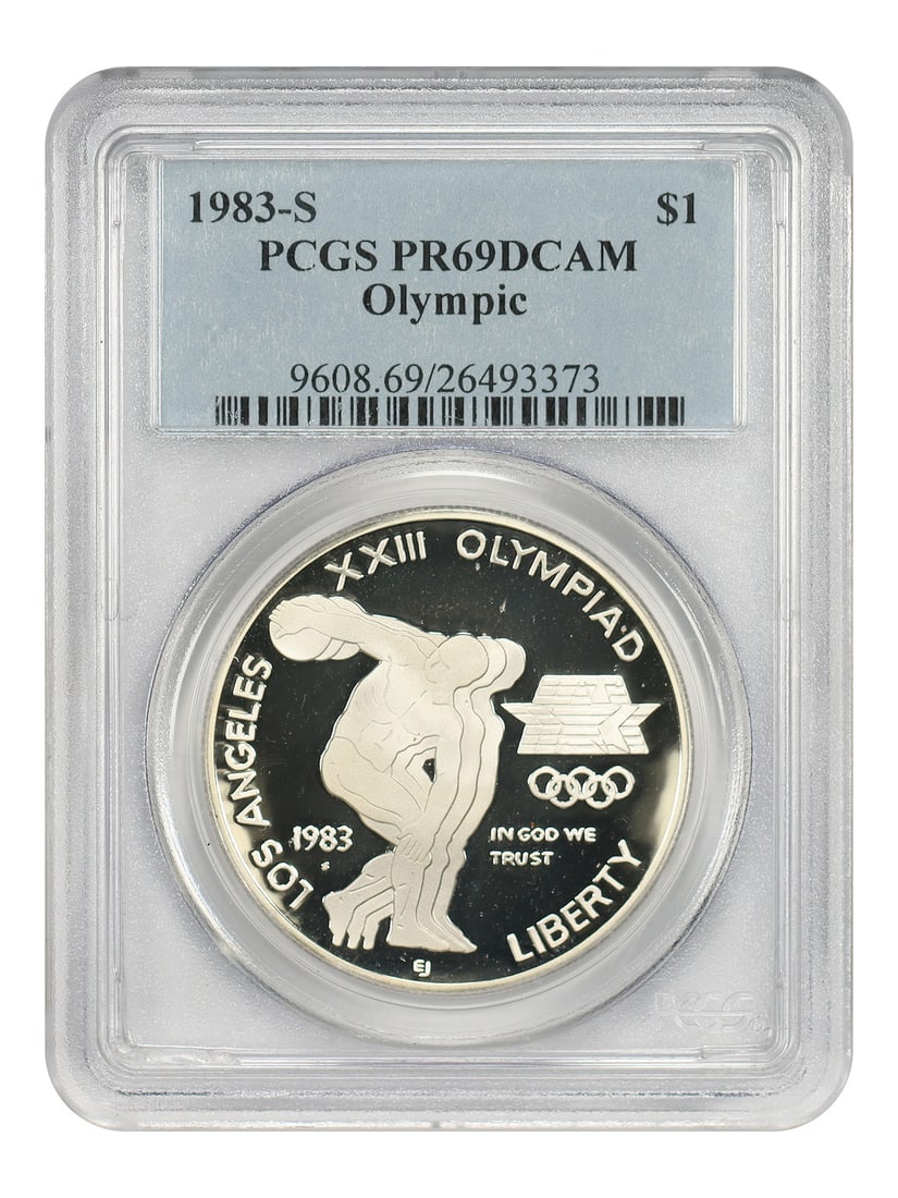 1983 San Francisco Olympic Silver Dollar PCGS PR69DCAM: 1983 San Francisco Olympic Silver Dollar PCGS PR69DCAM This 1983-S $1 Olympic commemorative coin is struck in silver and certified by PCGS with a grade of PR69DCAM, indicating a deep cameo proof in ne