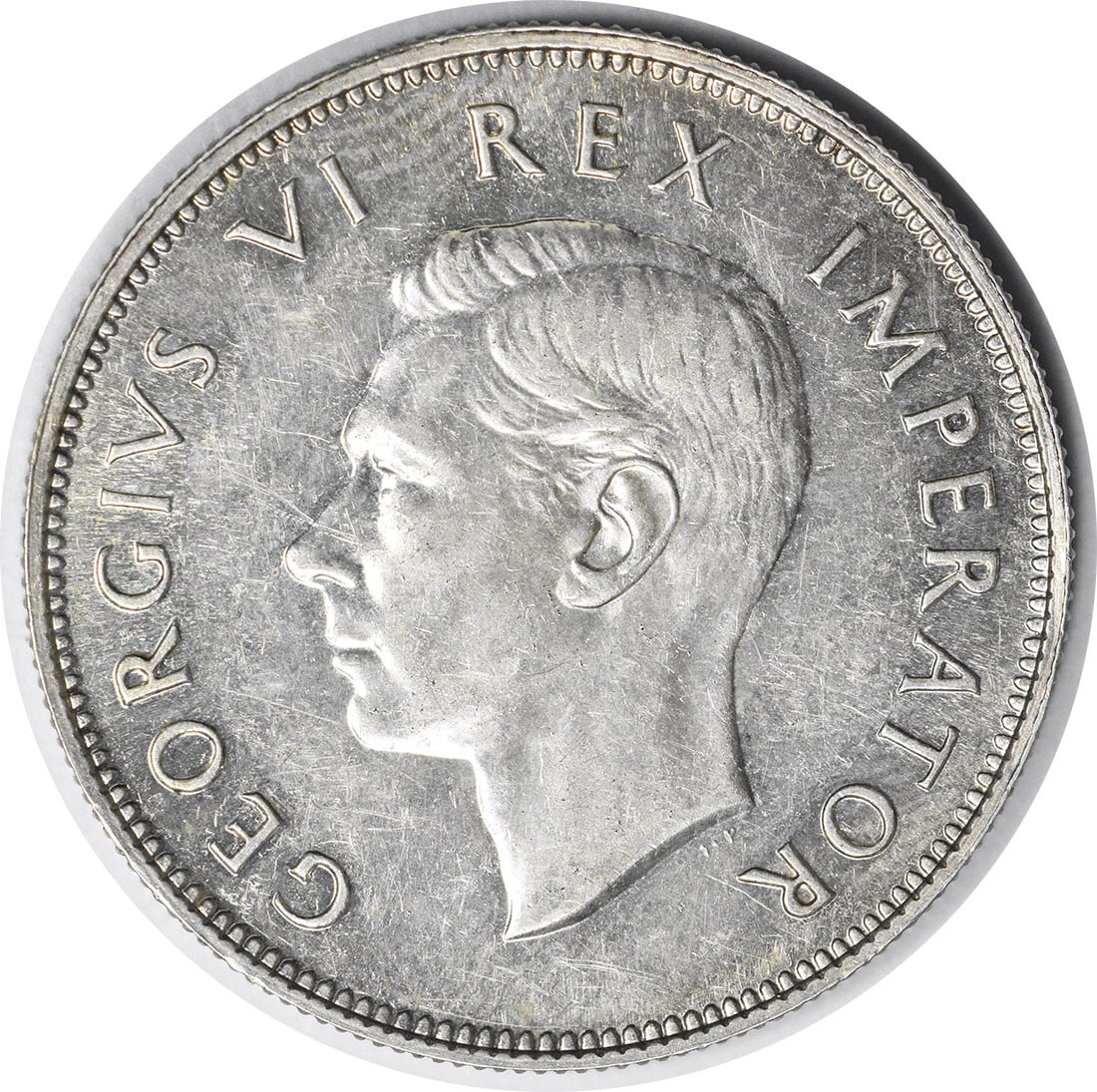 1947 South Africa 2.5 Shillings Proof Uncertified Coin: 1947 South Africa 2.5 Shillings Proof Uncertified Coin This 1947 South Africa 2 1/2 Shillings coin is a remarkable piece that showcases the craftsmanship of its time. It is graded as Proof, indicating