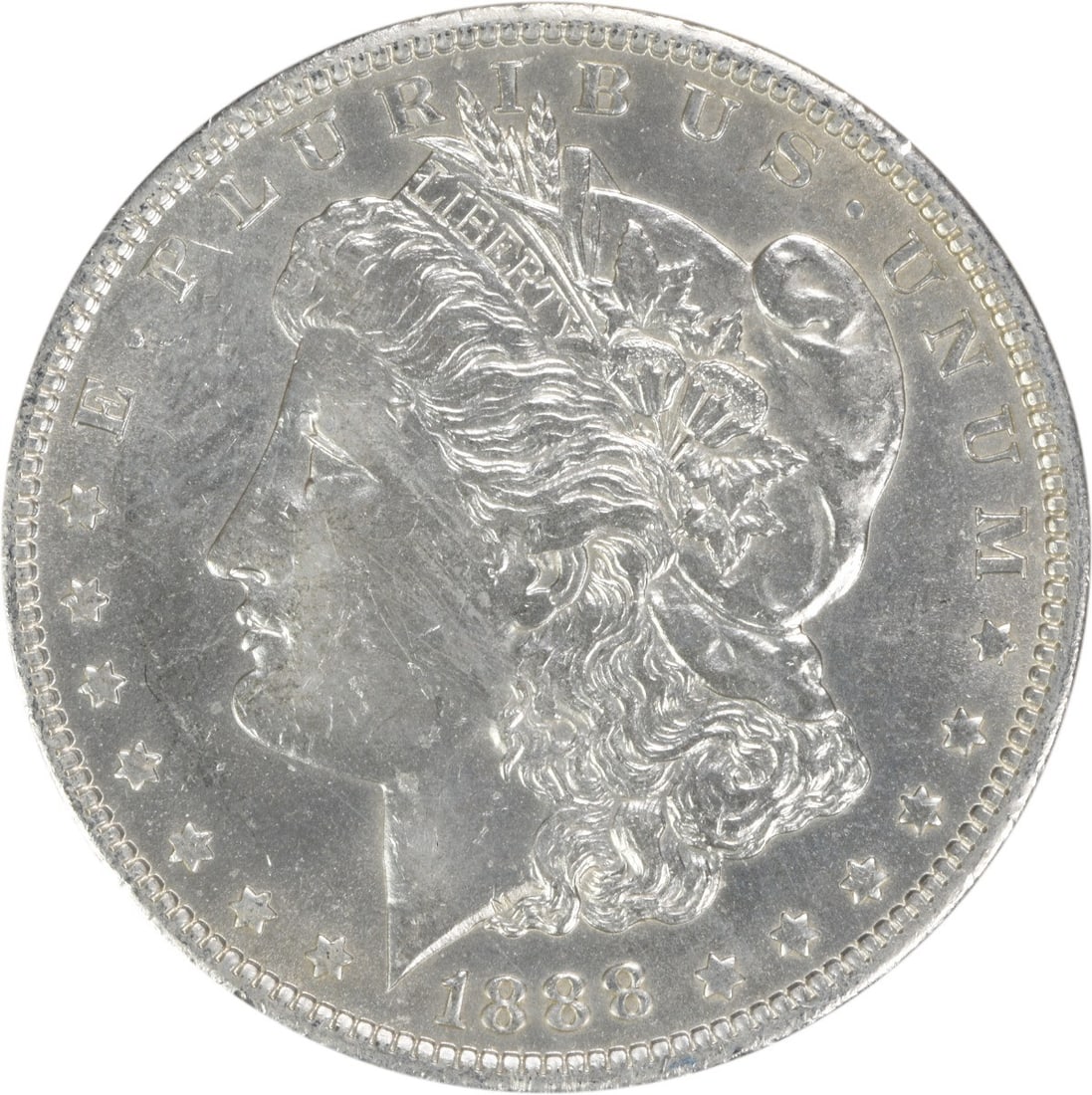 1888-O Morgan Silver Dollar AU Uncertified New Orleans Mint: 1888-O Morgan Silver Dollar AU Uncertified New Orleans Mint This 1888-O Morgan Silver Dollar is a beautifully circulated coin, showcasing the artistry of designer George T. Morgan. With a composition