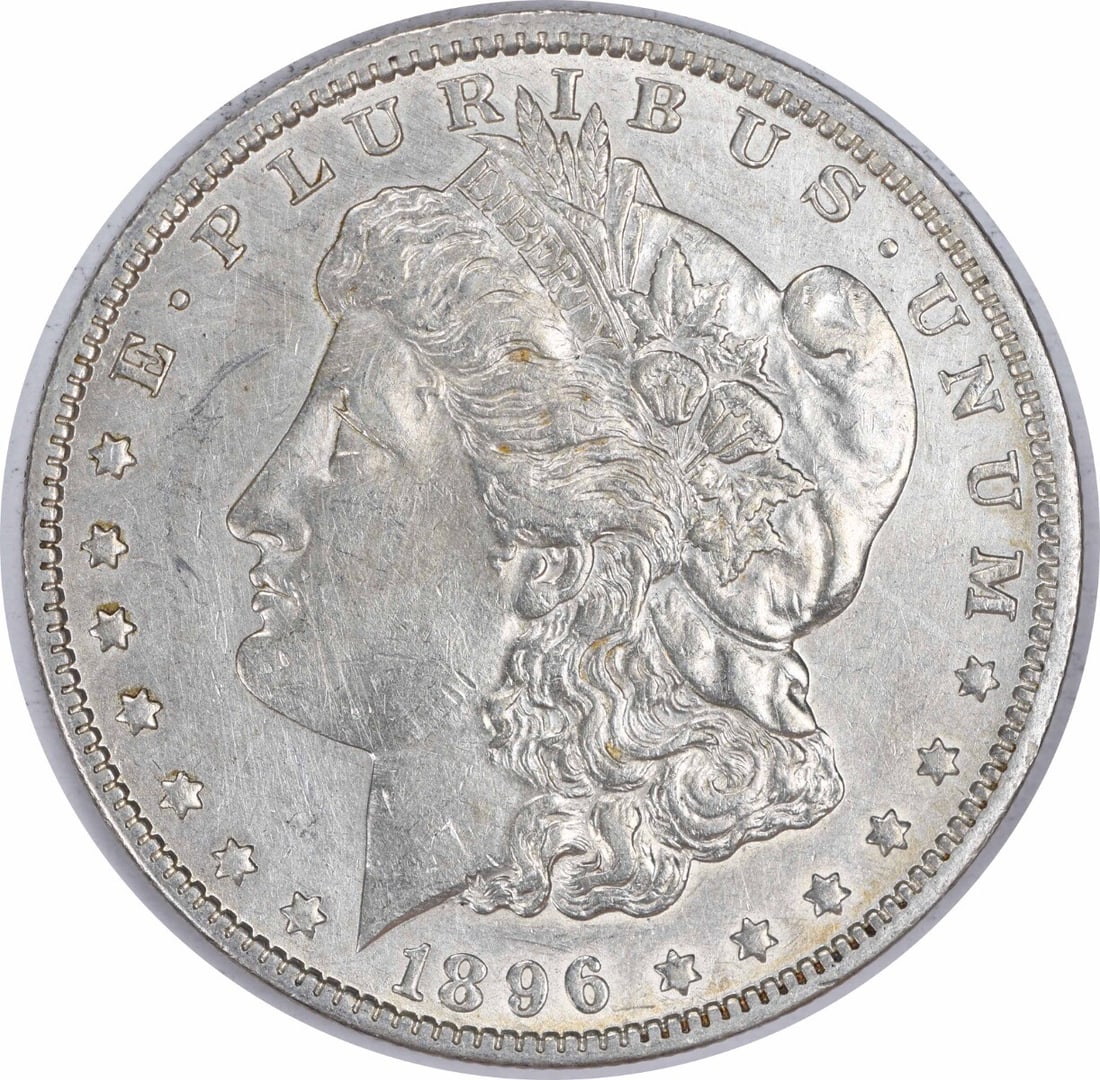 1896-O Morgan Silver Dollar AU Uncertified New Orleans Coin: 1896-O Morgan Silver Dollar AU Uncertified New Orleans Coin This 1896-O Morgan Silver Dollar is a beautiful representation of American coinage, featuring the classic design by George T. Morgan. The co