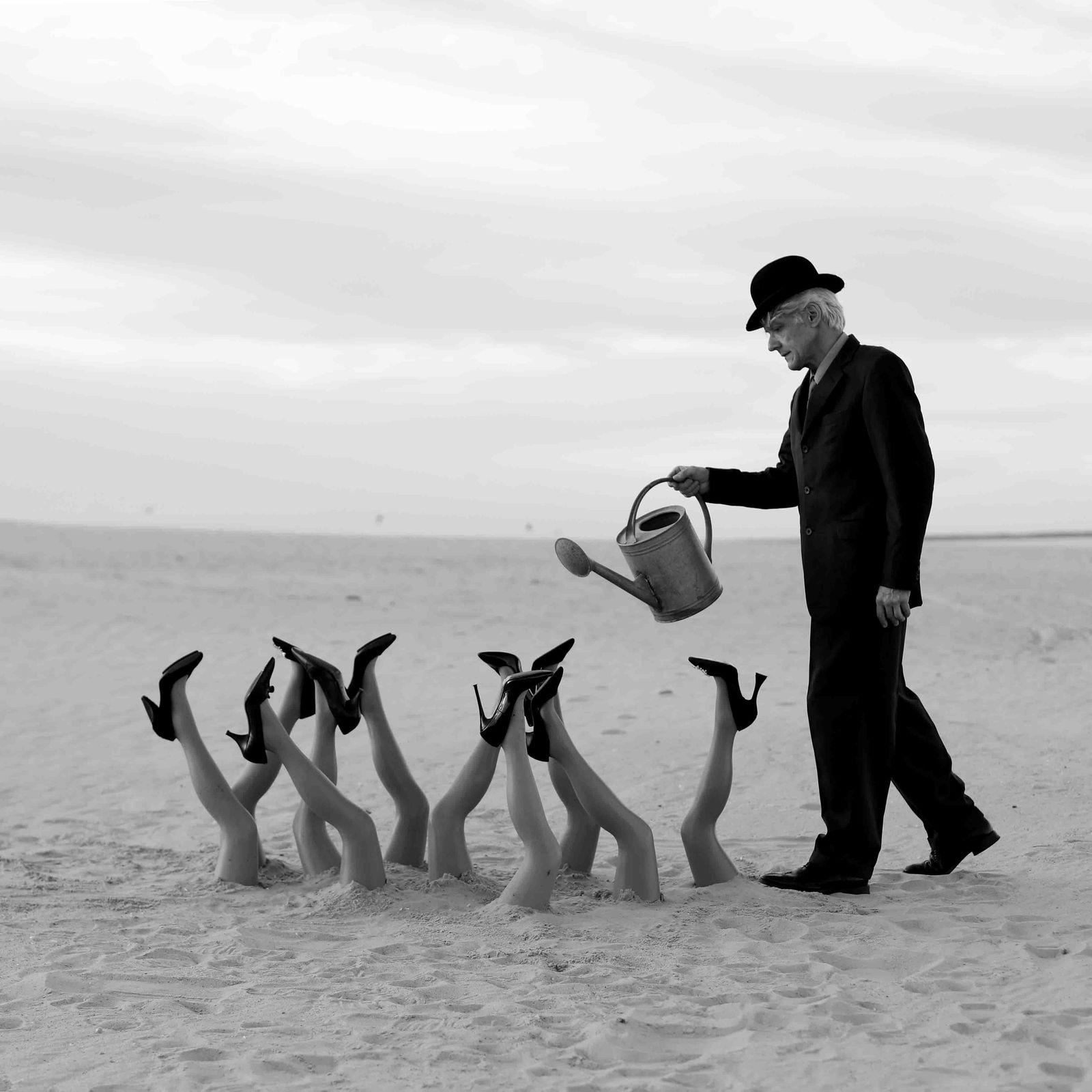 In the Garden Black and White Photography Ed. 3/3 by Olha Stepanian 39x39: In the Garden Black and White Photography Ed. 3/3 by Olha Stepanian 39x39 Experience the captivating beauty of "In the Garden," a stunning black and white photography piece by Olha Stepanian. This con