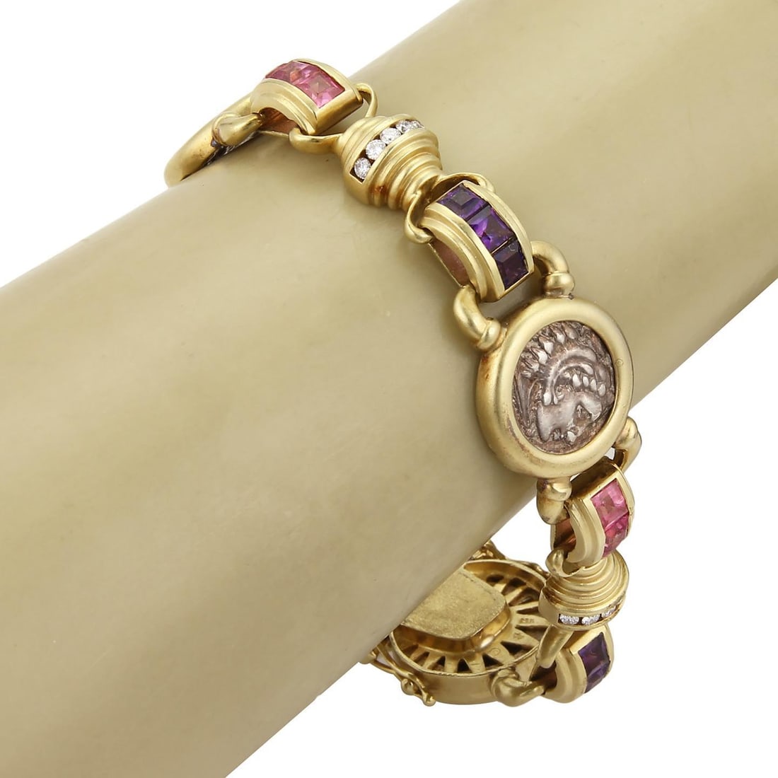 David Stern 18k Gold Roman Coin Bracelet with Diamonds and Gems: David Stern 18k Gold Roman Coin Bracelet with Diamonds and Gems This stunning bracelet, crafted from 18k yellow gold, showcases a unique design featuring three Roman coins by designer David Stern, com