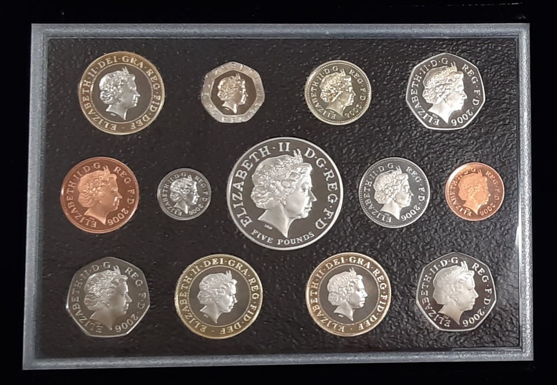 2006 United Kingdom 13-Piece Proof Coin Set in Blue Box with COA: 2006 United Kingdom 13-Piece Proof Coin Set in Blue Box with COA This 2006 Royal Mint Proof Coin Collection features 13 uncirculated proof coins from the United Kingdom, presented in the original Roya