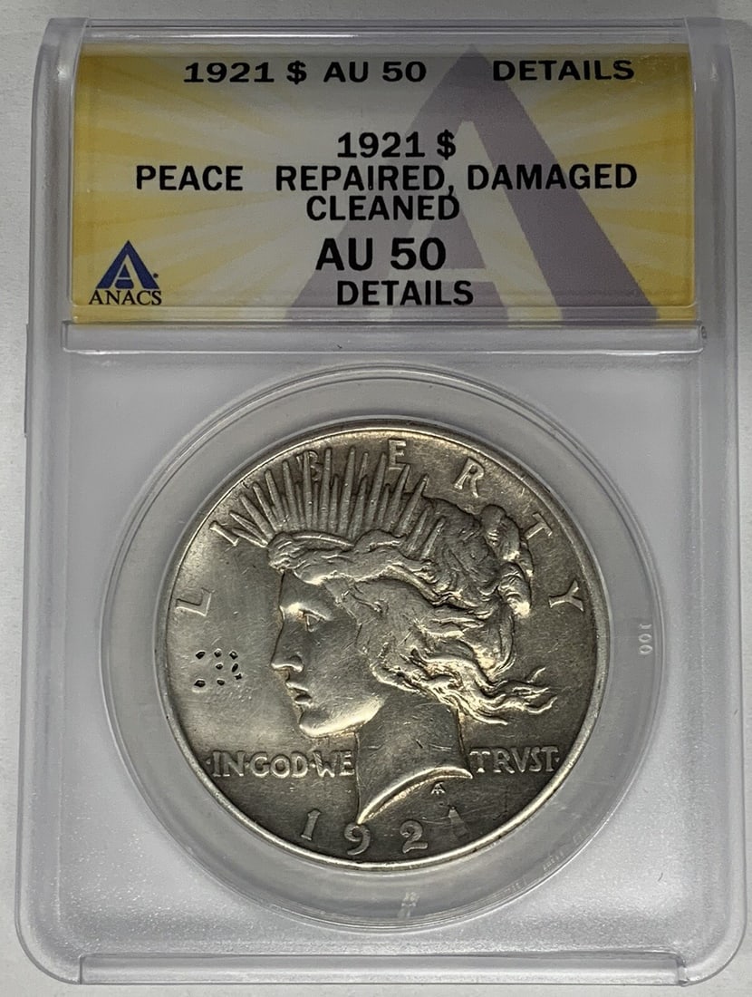 1921 Peace Dollar Silver Coin ANACS AU 50 Repaired Damaged Cleaned: 1921 Peace Dollar Silver Coin ANACS AU 50 Repaired Damaged Cleaned This 1921 Peace Silver Dollar coin has been certified by ANACS with a grade of AU 50. The coin is composed of silver and has a denomi