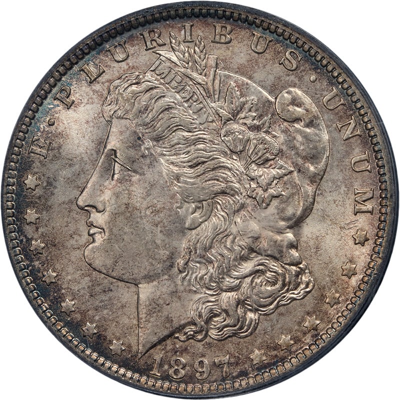 PCGS MS62 1897-O Silver Morgan Dollar Uncirculated New Orleans Mint Coin: PCGS MS62 1897-O Silver Morgan Dollar Uncirculated New Orleans Mint Coin This original 1897-O Morgan Silver Dollar features attractive eye appeal, strong luster, and a well-defined strike. The coin di