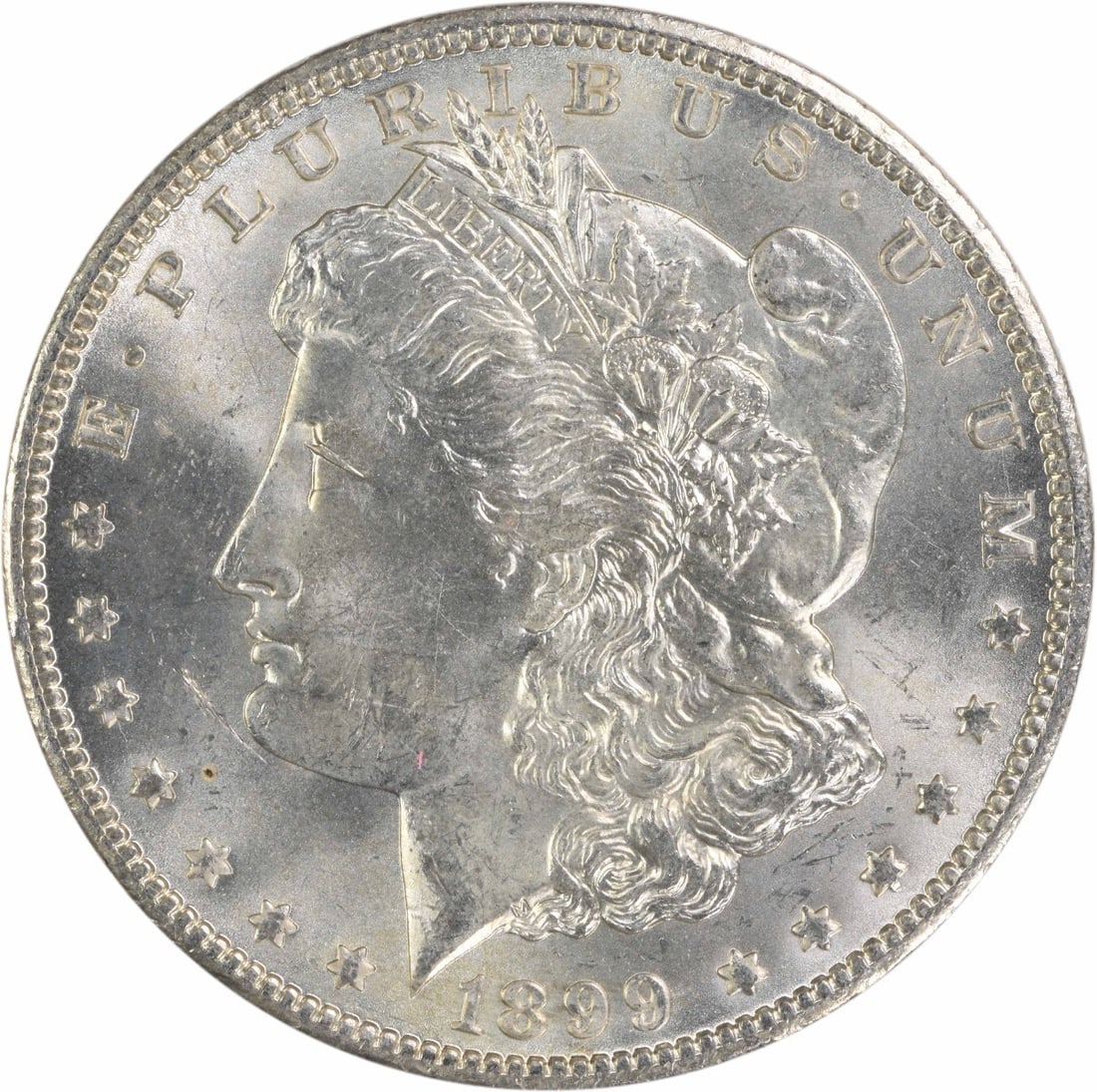 1899-O Morgan Silver Dollar Choice BU Uncertified: 1899-O Morgan Silver Dollar Choice BU Uncertified This 1899-O Morgan Silver Dollar is a stunning example of early American coinage, showcasing a choice Brilliant Uncirculated (BU) condition. It featur