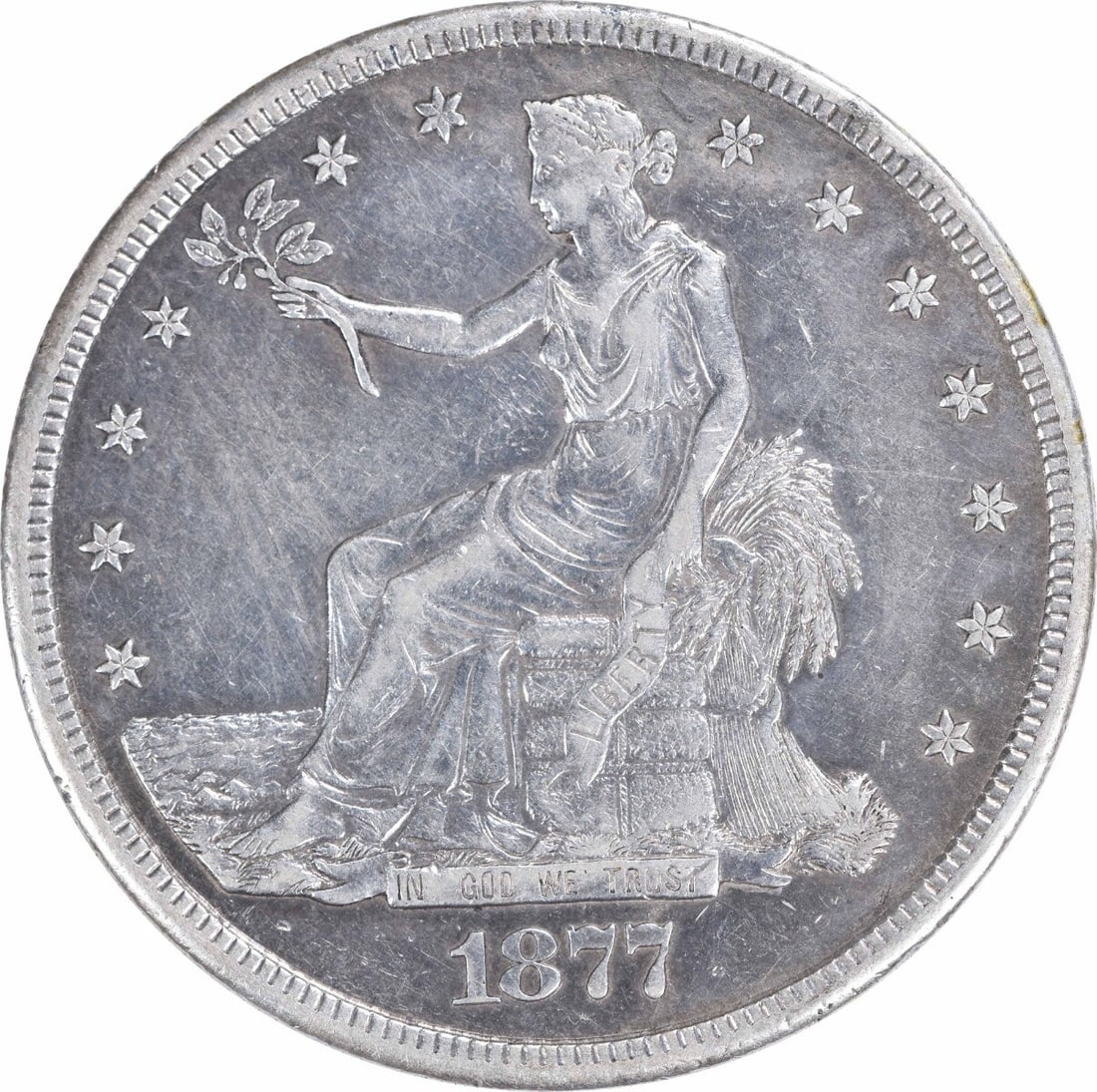 1877-S Trade Silver Dollar XF 90% Silver San Francisco Coin: 1877-S Trade Silver Dollar XF 90% Silver San Francisco Coin This 1877-S Trade Silver Dollar is a remarkable piece of history, featuring a design by William Barber. Struck at the San Francisco mint, th