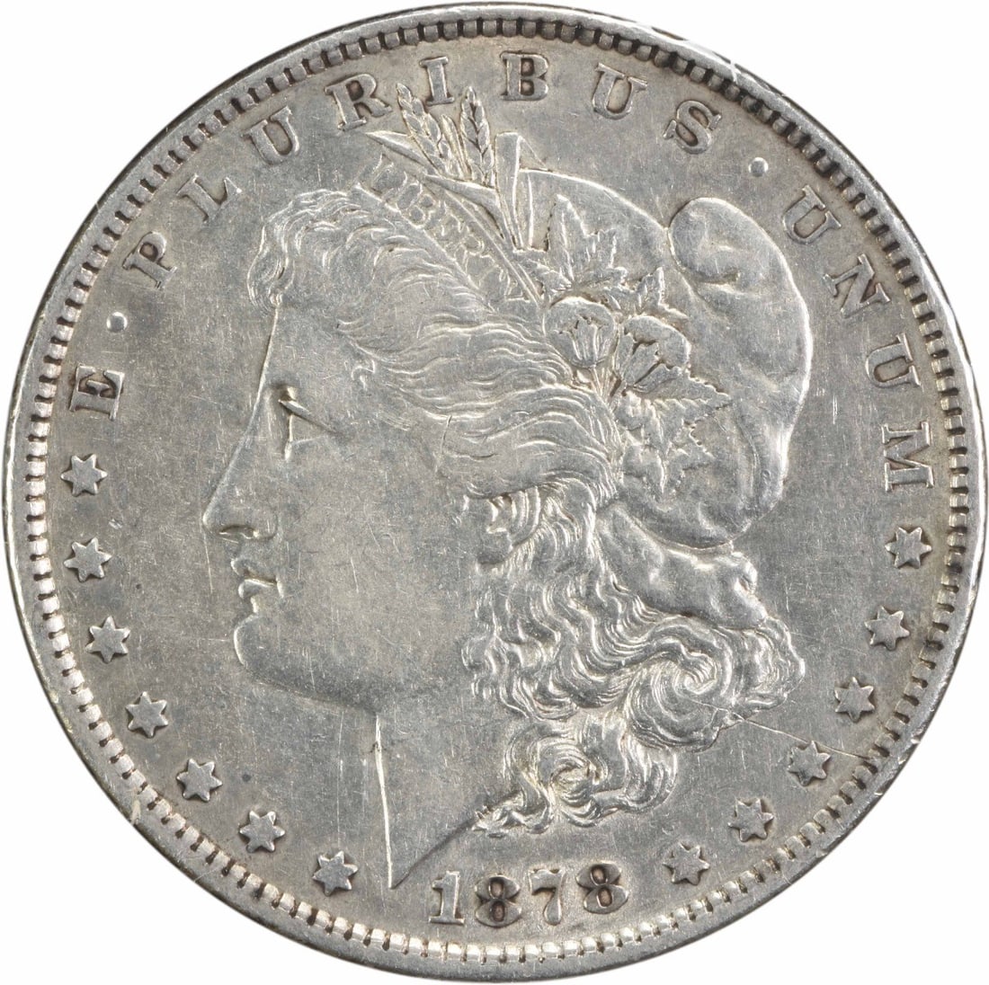1878 Morgan Silver Dollar AU George T. Morgan 90% Silver: 1878 Morgan Silver Dollar AU George T. Morgan 90% Silver This 1878 Morgan Silver Dollar showcases the artistry of designer George T. Morgan. It is composed of 90% silver and 10% copper, featuring a di
