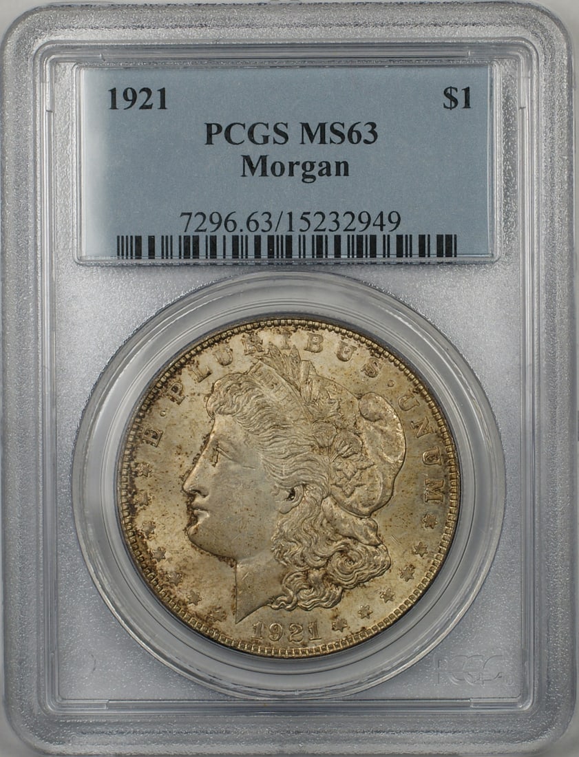 PCGS MS-63 1921 Toned Morgan Silver Dollar Coin from Philadelphia Mint: PCGS MS-63 1921 Toned Morgan Silver Dollar Coin from Philadelphia Mint This 1921 Morgan Silver Dollar $1 coin is graded MS-63 by PCGS and features attractive toning. Struck in Philadelphia, it is comp
