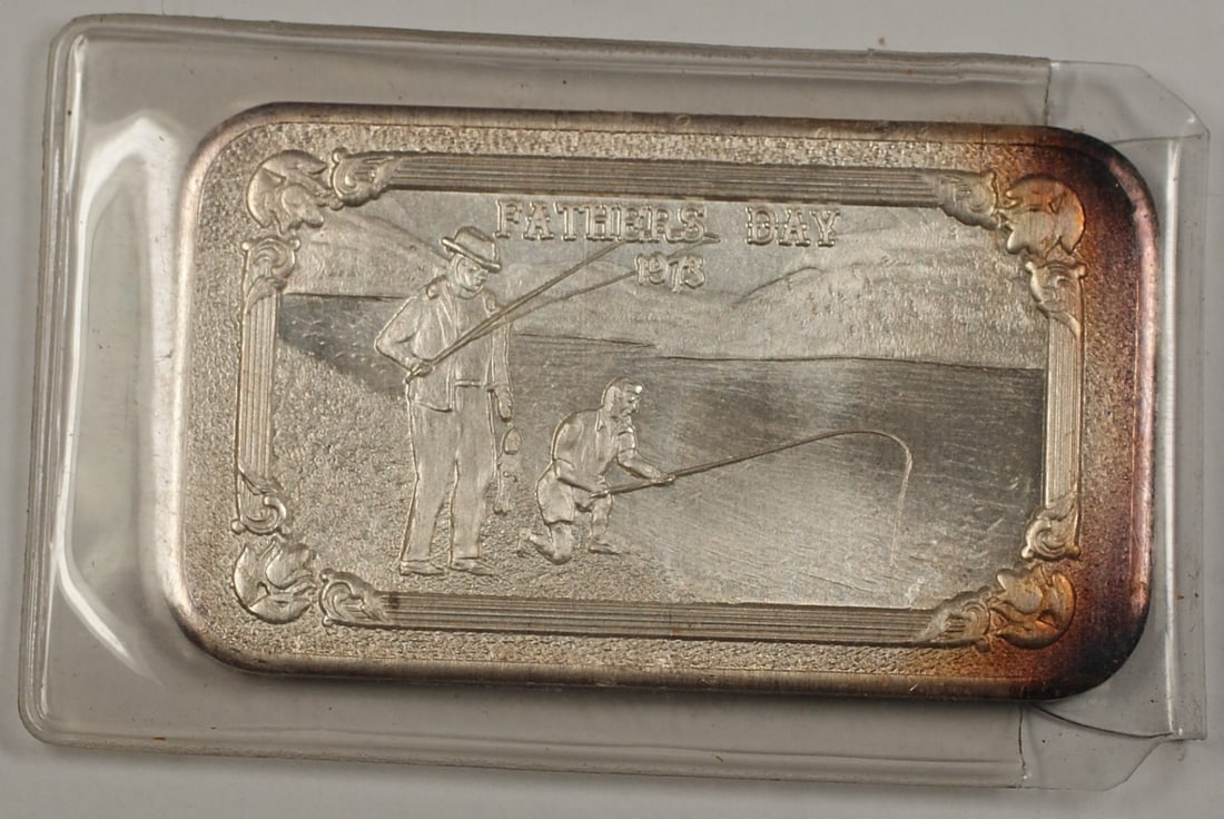 1973 Father's Day 1 Troy Ounce Fine Silver Bar by Mother-Lode Mint: 1973 Father's Day 1 Troy Ounce Fine Silver Bar by Mother-Lode Mint This 1 troy ounce fine silver ingot was produced by Mother-Lode Mint to commemorate Father's Day in 1973. Crafted in the United State