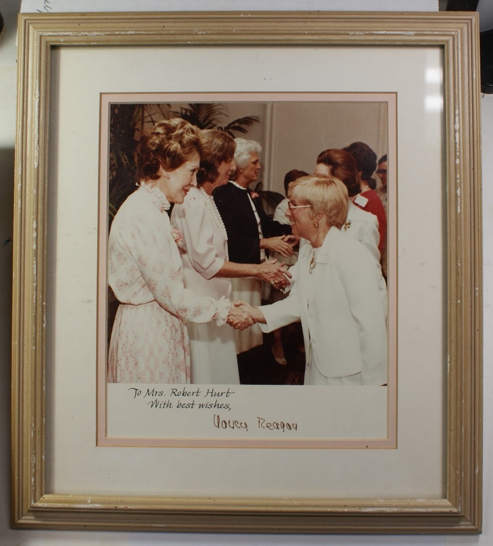 Framed Nancy Reagan Signed Photo for Mrs. Robert Hurst 12.5 x 14 Inch: Framed Nancy Reagan Signed Photo for Mrs. Robert Hurst 12.5 x 14 Inch This framed photograph features the signature of Nancy Reagan and is dedicated to Mrs. Robert Hurst. The piece originates from the
