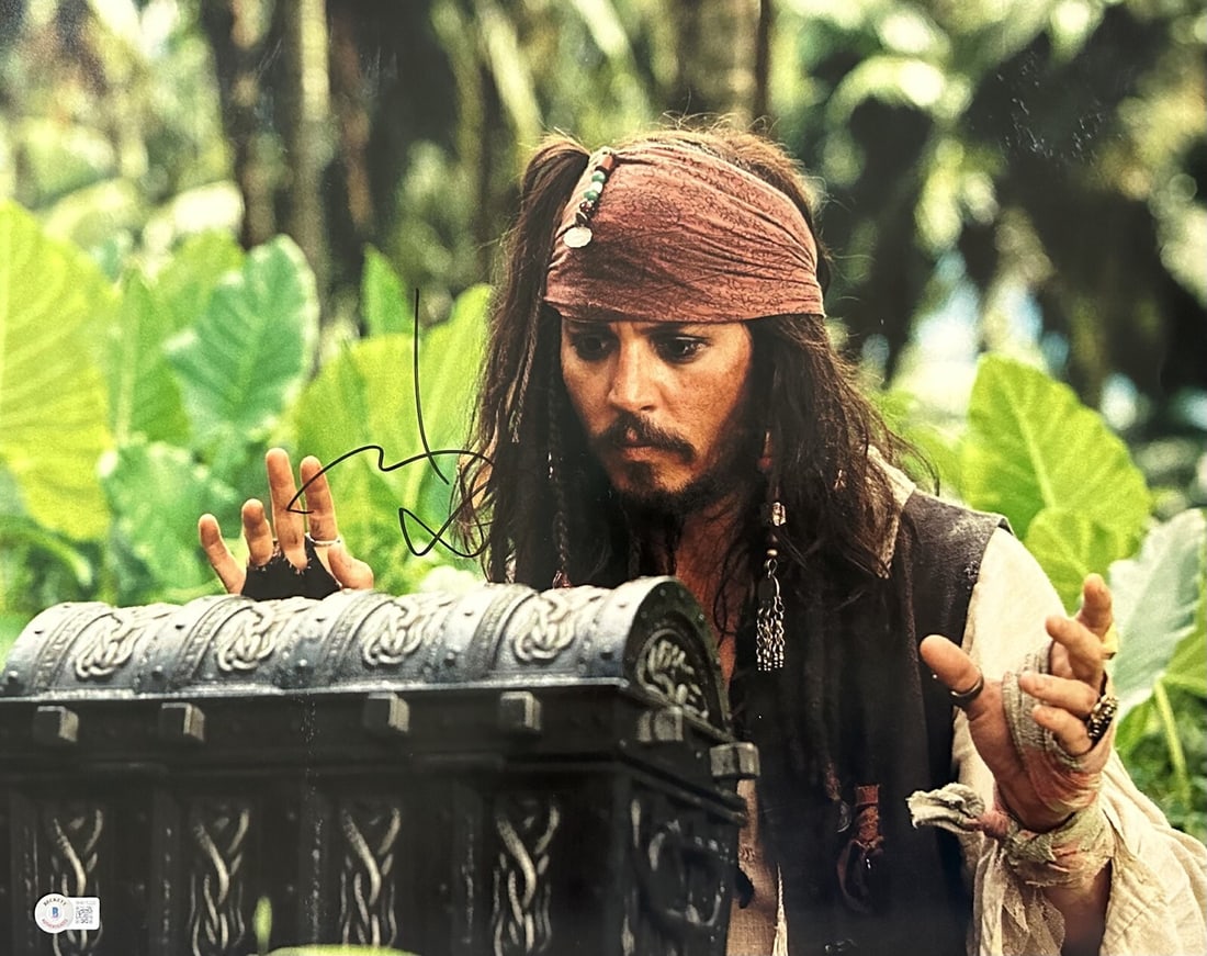 Johnny Depp Signed 16x20 Jack Sparrow Photo Beckett Certified: Johnny Depp Signed 16x20 Jack Sparrow Photo Beckett Certified This captivating 16x20 photograph features Johnny Depp portraying the iconic character Jack Sparrow from the beloved Pirates of the Caribb
