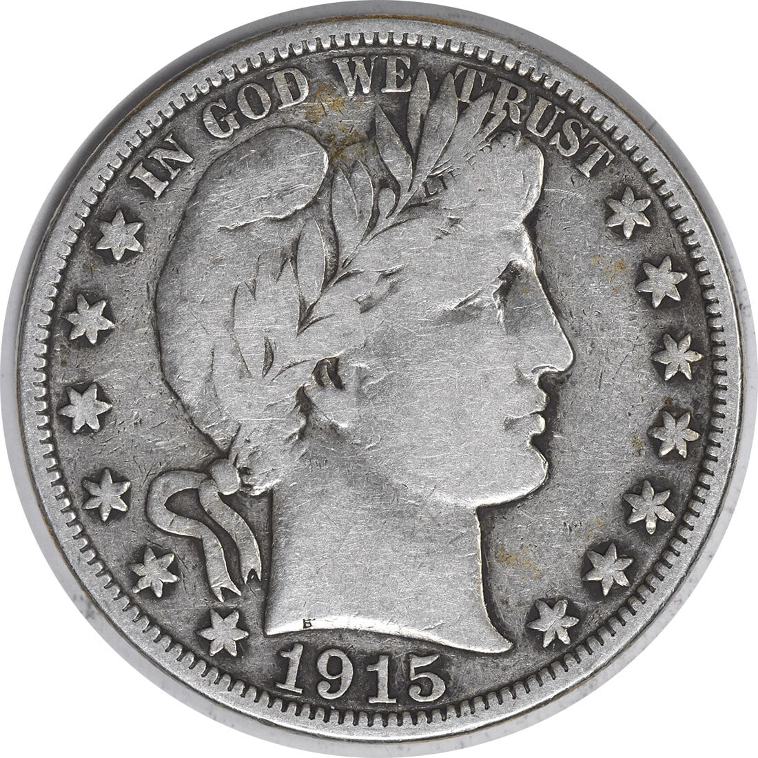1915 Barber Half Dollar 50C Uncertified 90% Silver Philadelphia Mint: 1915 Barber Half Dollar 50C Uncertified 90% Silver Philadelphia Mint This 1915 Barber Silver Half Dollar is a classic piece of American numismatics, featuring the intricate design by Charles E. Barber