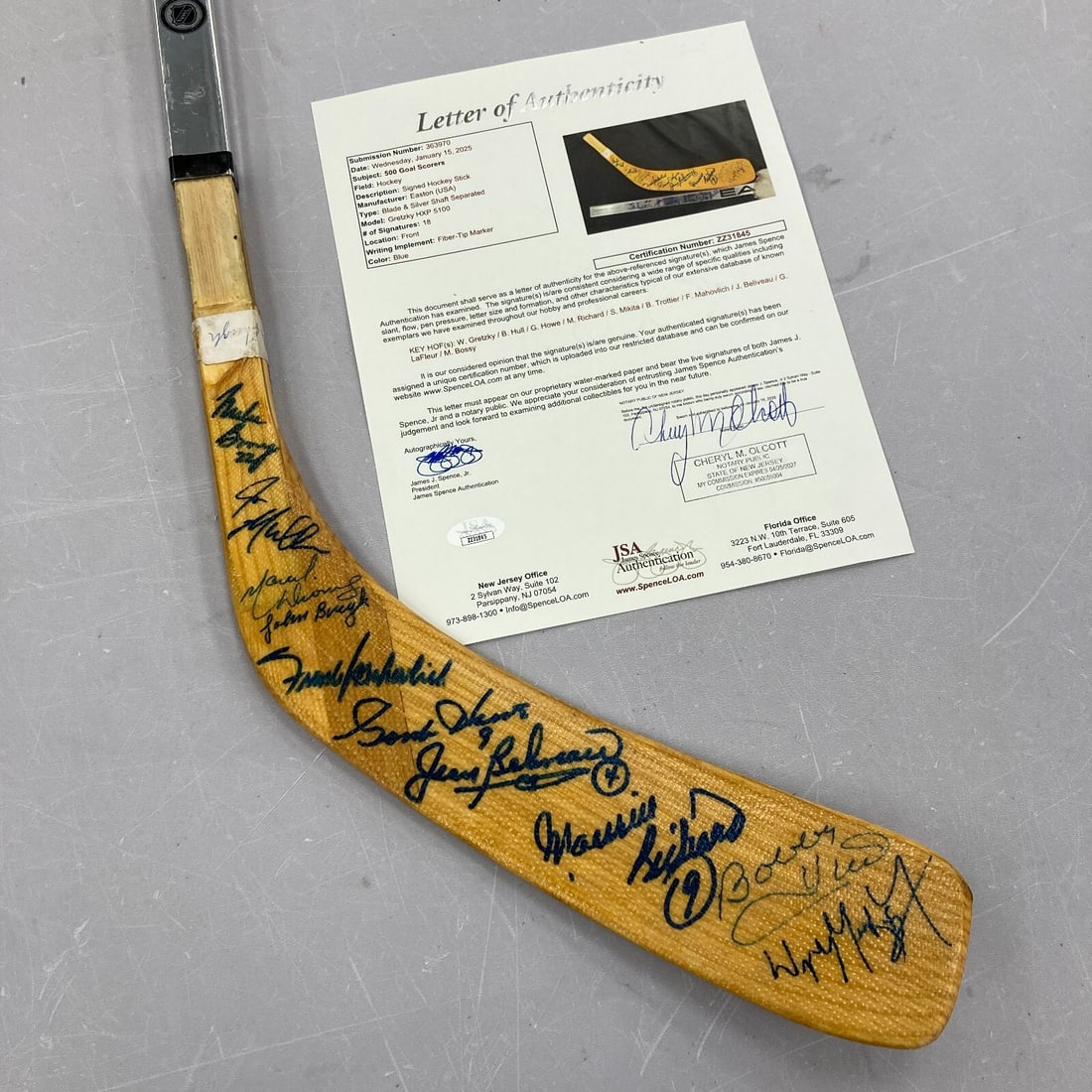 Wayne Gretzky Signed Game Model Hockey Stick with 18 Signatures JSA COA: Wayne Gretzky Signed Game Model Hockey Stick with 18 Signatures JSA COA This is a remarkable NHL collectible featuring a Wayne Gretzky game model hockey stick, signed by 18 legendary players. This ori