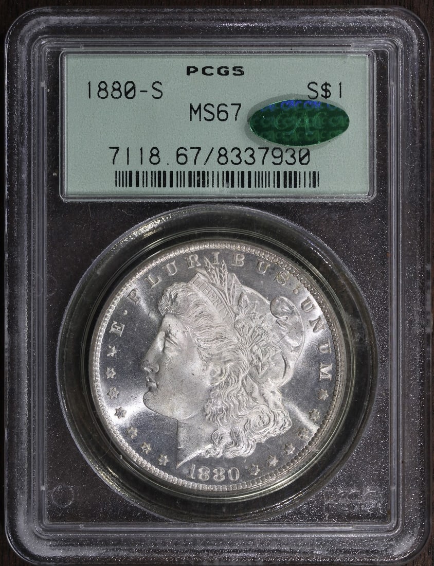 MS67 CAC 1880-S Morgan Silver Dollar PCGS Old Green Holder: MS67 CAC 1880-S Morgan Silver Dollar PCGS Old Green Holder This is an un-used 1880-S Morgan Silver Dollar graded MS67 by PCGS and certified by CAC. Minted in San Francisco, this superb gem coin is com