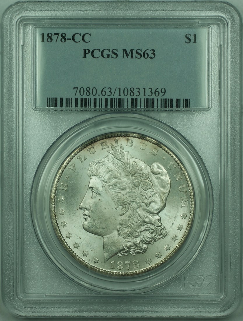 PCGS MS-63 1878 Carson City Morgan Silver Dollar One Dollar Coin: PCGS MS-63 1878 Carson City Morgan Silver Dollar One Dollar Coin This 1878-CC Morgan Silver Dollar is certified by PCGS with a grade of MS-63. Minted in Carson City, it features a $1 denomination, a s