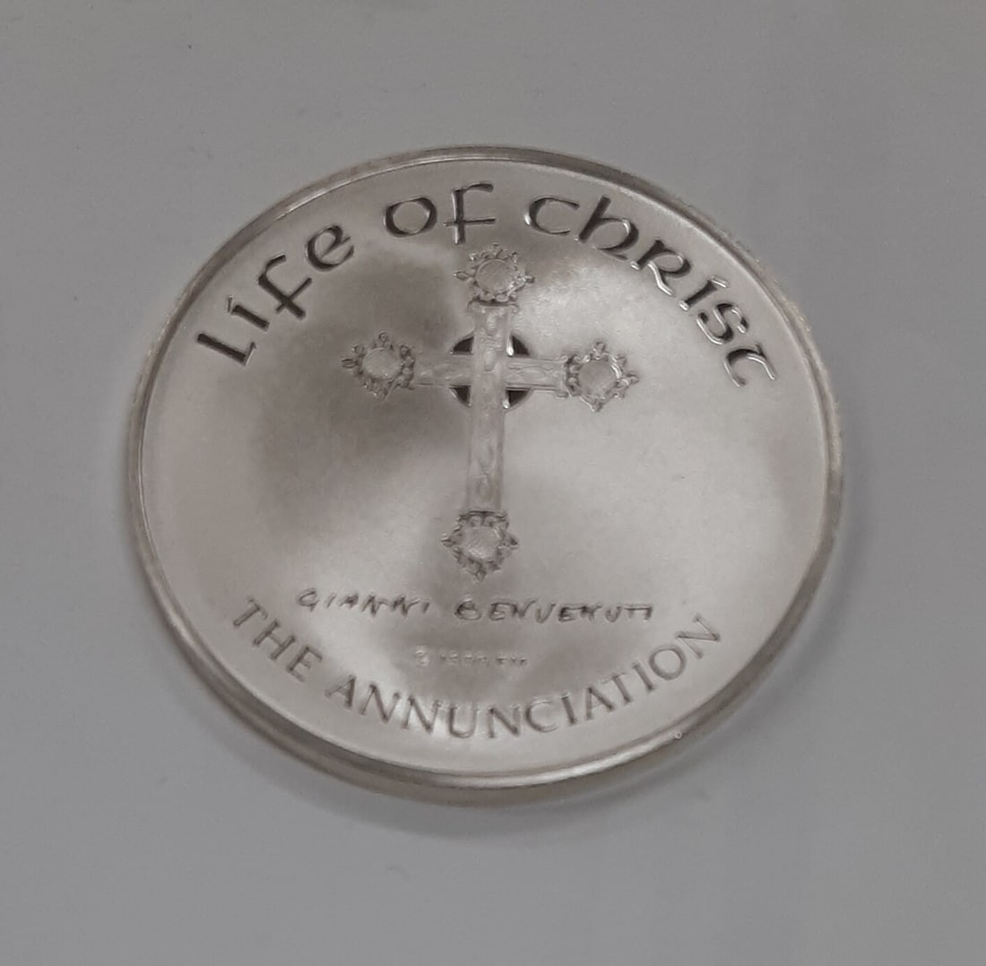 Sterling Silver Annunciation Medal Life of Christ Series by Benvenuti: Sterling Silver Annunciation Medal Life of Christ Series by Benvenuti This Franklin Mint Life of Christ silver medal, titled 'The Annunciation,' features the artwork of Gianni Benvenuti. Produced in t