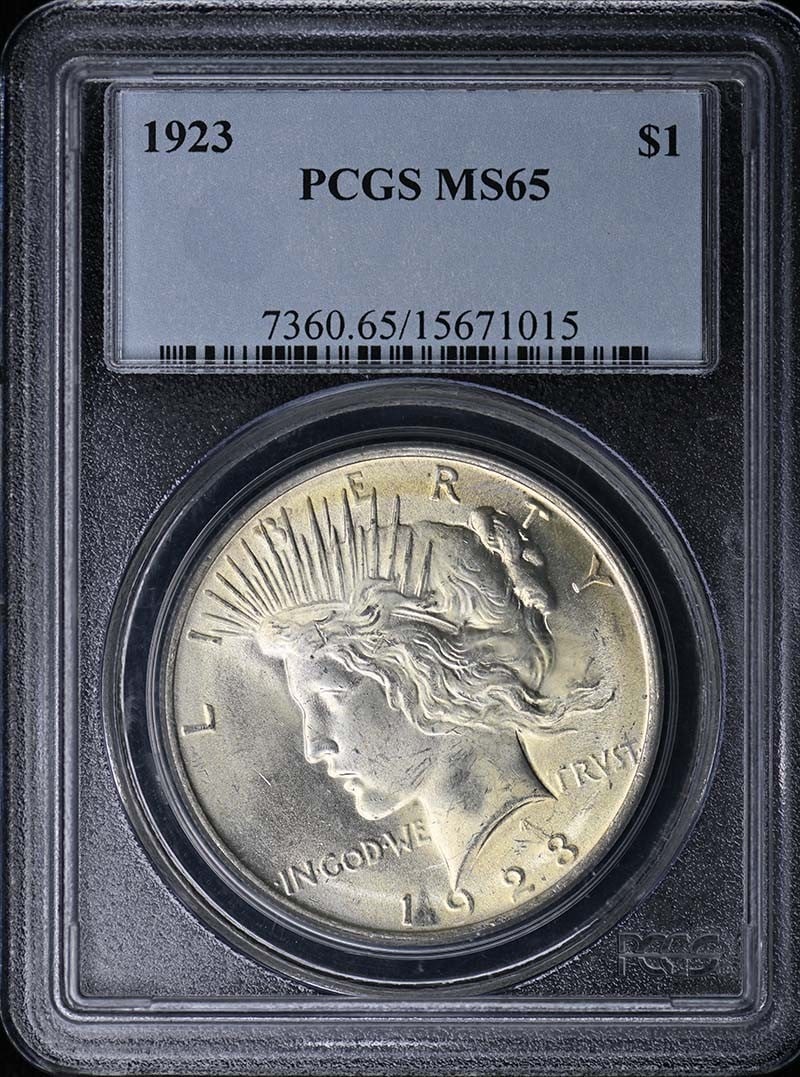 1923 Peace Dollar Uncirculated $1 Silver Coin Graded MS65 by PCGS (1 of 2)