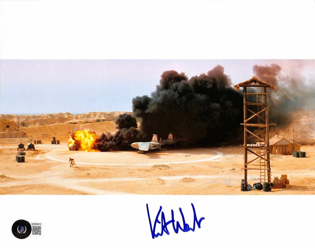 Indiana Jones 8x10 Signed Photo by Oscar Winner Kit West Beckett Authenticated: Indiana Jones 8x10 Signed Photo by Oscar Winner Kit West Beckett Authenticated This rare 8x10 color photograph captures a pivotal explosion sequence from "Indiana Jones and the Raiders of the Lost Ark