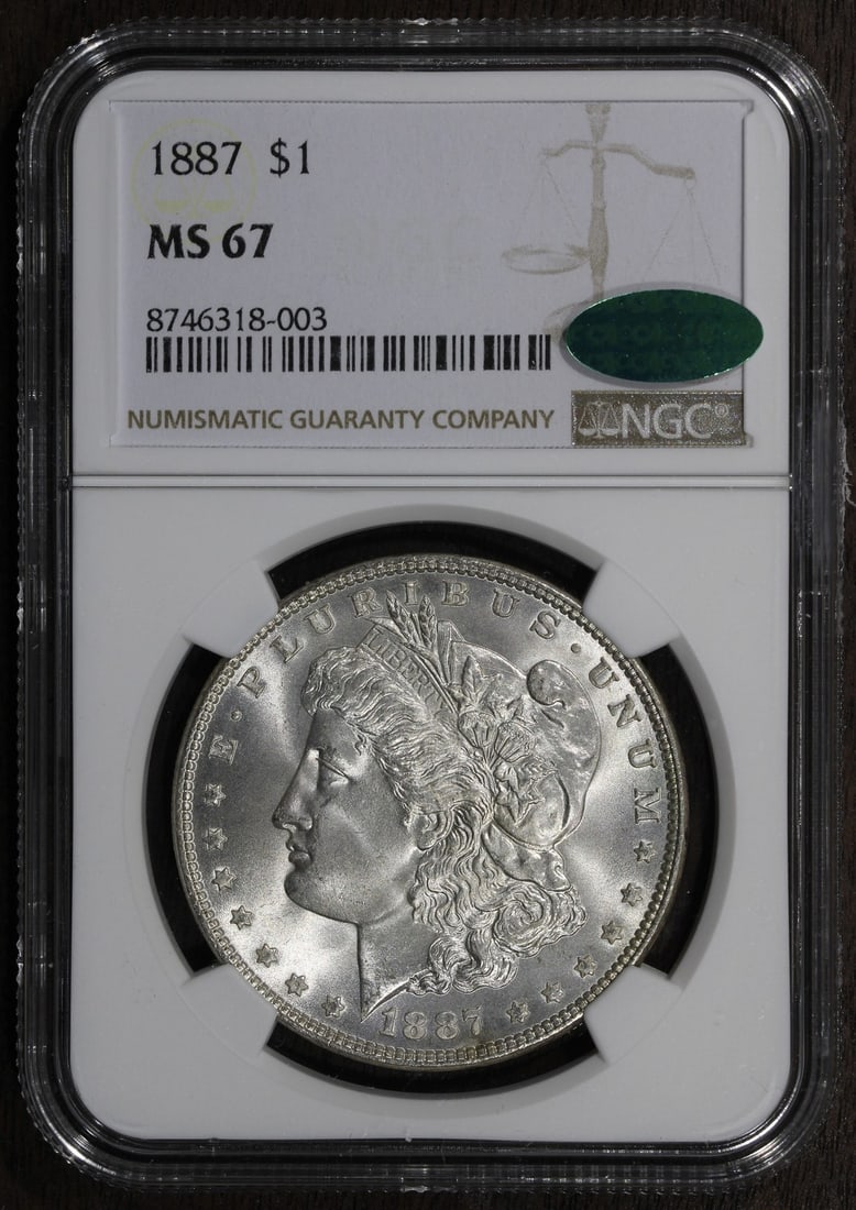 MS67 CAC 1887 Morgan Dollar NGC Certified Silver Coin: MS67 CAC 1887 Morgan Dollar NGC Certified Silver Coin This is an 1887 Morgan Silver Dollar graded MS67 by NGC and certified by CAC, indicating a superb gem quality. The coin is uncirculated and was mi