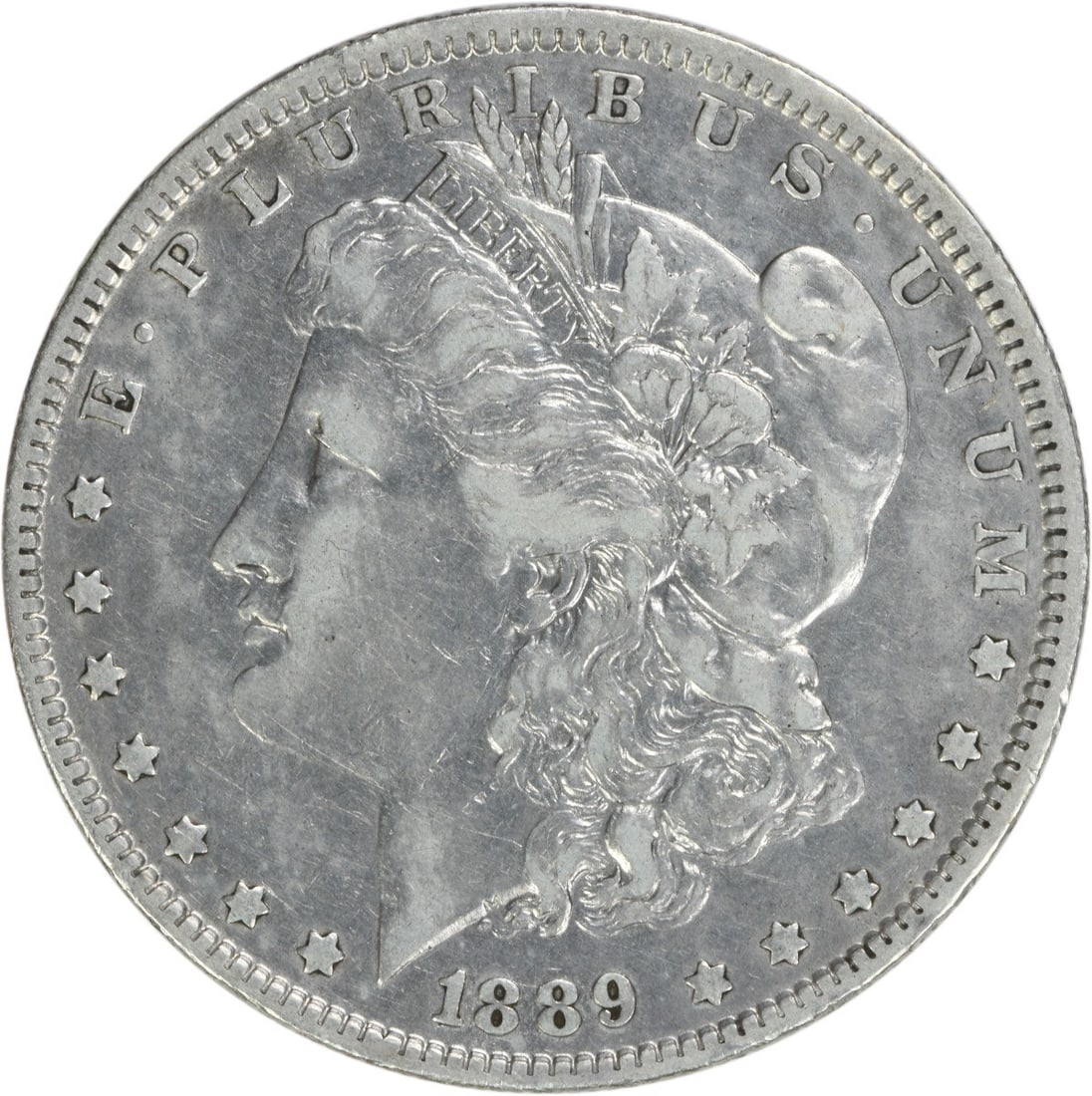 1889-O Morgan Silver Dollar EF Uncertified 90% Silver Coin: 1889-O Morgan Silver Dollar EF Uncertified 90% Silver Coin This 1889-O Morgan Silver Dollar is a stunning example of American coinage, featuring a design by George T. Morgan. Struck at the New Orleans