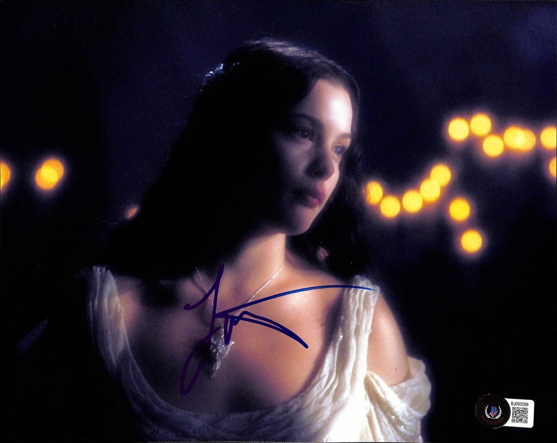 8x10 Photo Signed by Liv Tyler as Arwen with Beckett Authentication: 8x10 Photo Signed by Liv Tyler as Arwen with Beckett Authentication This is an autographed 8x10 photograph signed by Liv Tyler, who portrayed Arwen in the Lord of the Rings movie trilogy. The signatur