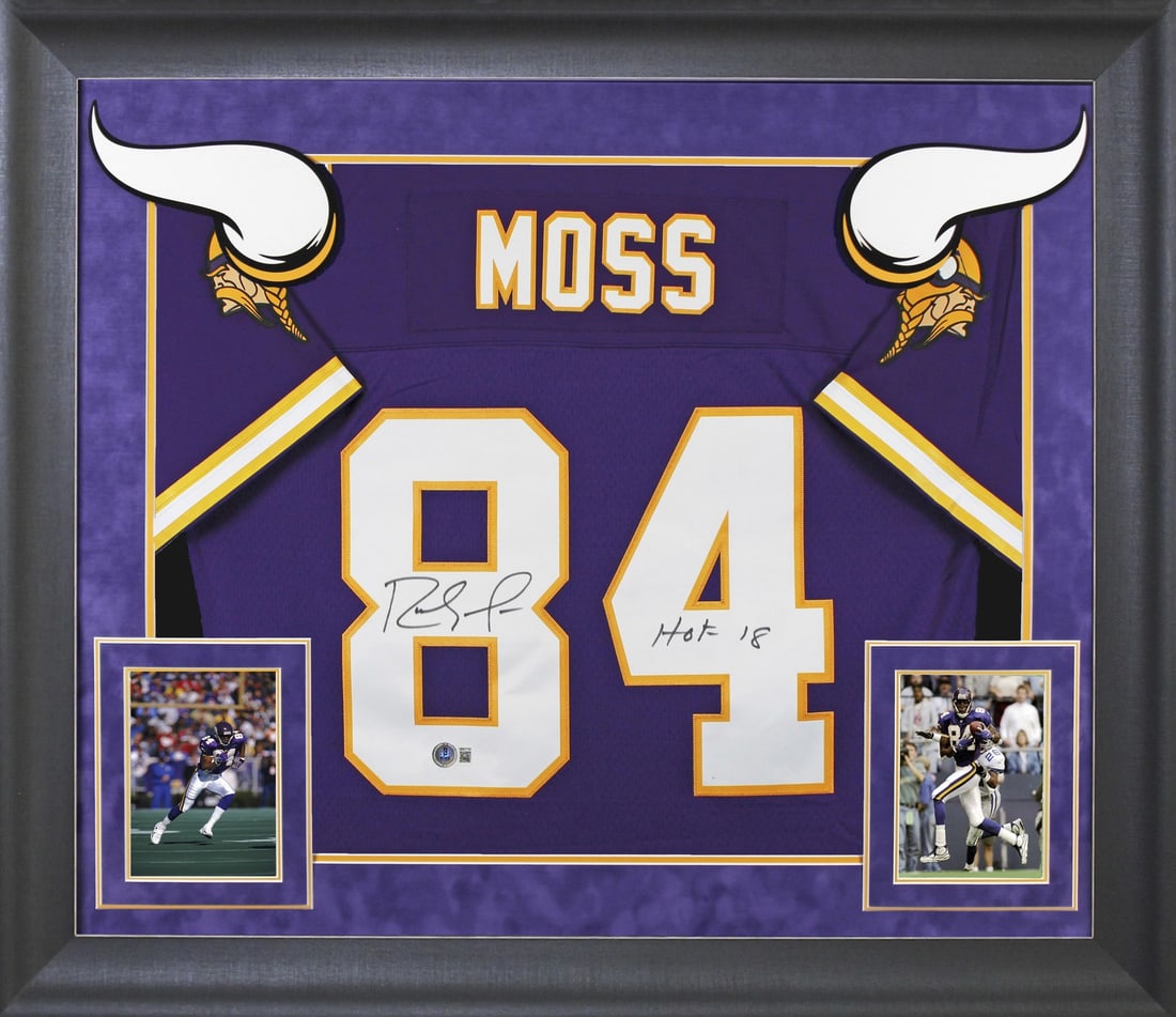 Randy Moss Signed Purple Mitchell & Ness Framed Jersey HOF 18 BAS: Randy Moss Signed Purple Mitchell & Ness Framed Jersey HOF 18 BAS Celebrate the legacy of Randy Moss with this original autographed purple Mitchell & Ness throwback jersey, featuring the inscription "