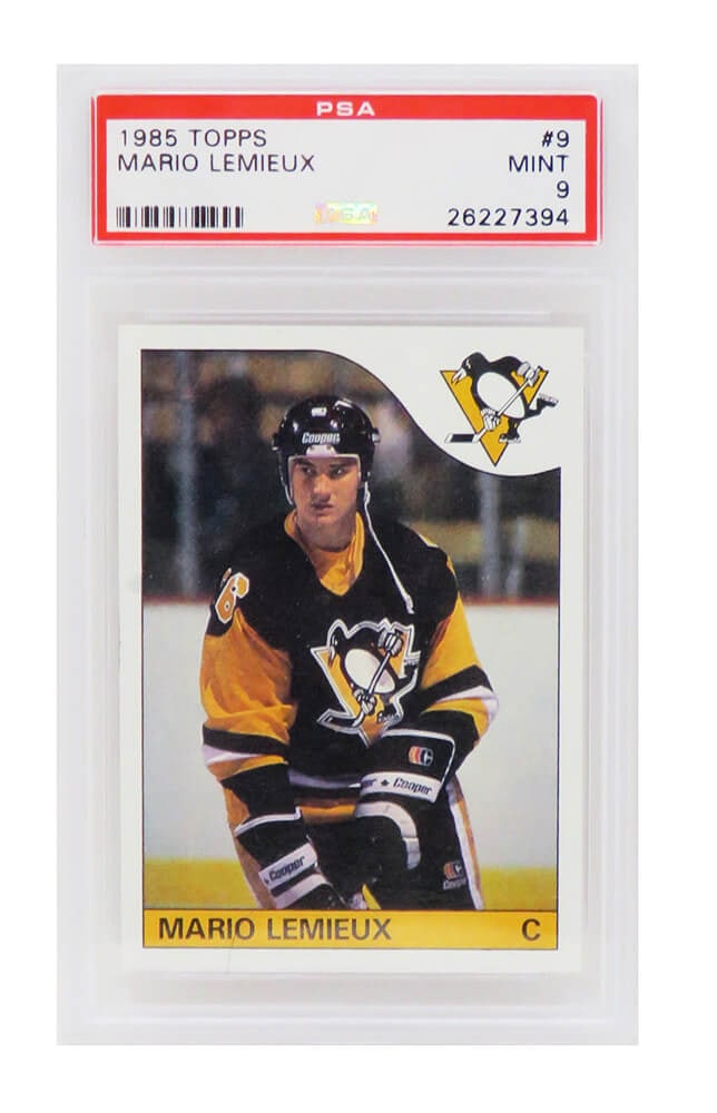 Mario Lemieux 1985 Topps Hockey RC Card #9 PSA 9 Mint: Mario Lemieux 1985 Topps Hockey RC Card #9 PSA 9 Mint Celebrate the legendary career of Mario Lemieux with this encapsulated 1985 Topps Hockey rookie card, graded Mint 9 by Professional Sports Authent