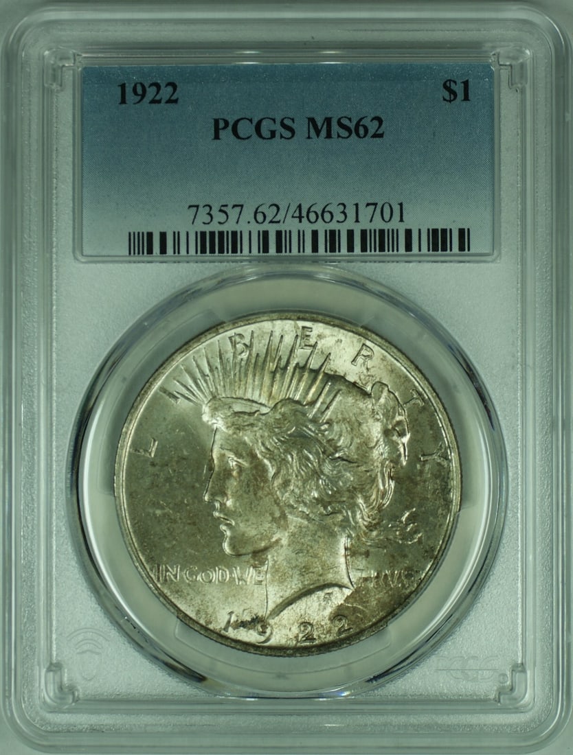 PCGS MS62 1922 Peace Dollar Silver Coin With Light Toning: PCGS MS62 1922 Peace Dollar Silver Coin With Light Toning This 1922 Peace Silver Dollar features a light toning and is certified by PCGS with a grade of MS-62. Struck in the United States at the Phila