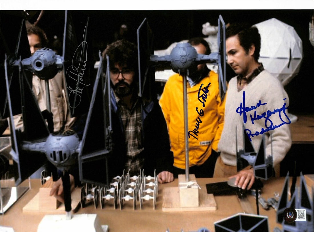 Star Wars ROTJ Signed Photo by Crew Thomas G Smith Lorne Peterson Howard Kazanjian: Star Wars ROTJ Signed Photo by Crew Thomas G Smith Lorne Peterson Howard Kazanjian This stunning 11x14 color photograph captures behind-the-scenes moments from Star Wars: Return of the Jedi, featuring