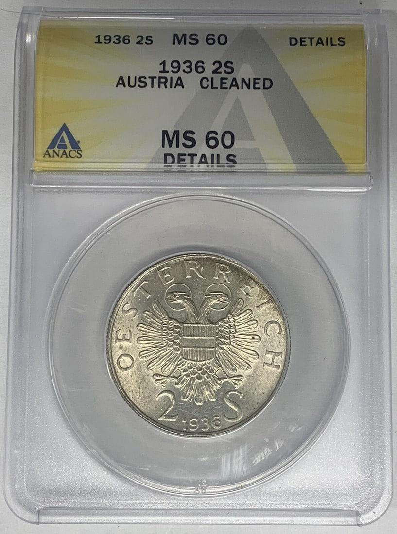 Uncirculated 1936 Austria 2 Shilling Silver Coin ANACS MS 60 Details Cleaned: Uncirculated 1936 Austria 2 Shilling Silver Coin ANACS MS 60 Details Cleaned This is a 1936 Austria 2 Shilling coin composed of silver. The coin is graded MS 60 by ANACS and has been noted as having b