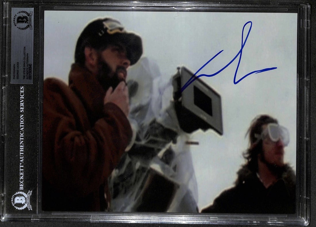 George Lucas Signed 8x10 Star Wars Behind-the-Scenes Photo Beckett Authenticated: George Lucas Signed 8x10 Star Wars Behind-the-Scenes Photo Beckett Authenticated This rare 8x10 behind-the-scenes photograph captures George Lucas during the production of the original Star Wars (1977
