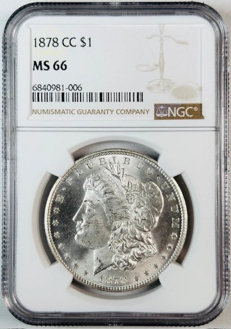 NGC MS-66 1878 Carson City Morgan Silver Dollar White Uncirculated: NGC MS-66 1878 Carson City Morgan Silver Dollar White Uncirculated This 1878 Carson City Morgan Silver Dollar is graded MS-66 by NGC and is uncirculated with a white appearance. Minted in Carson City,