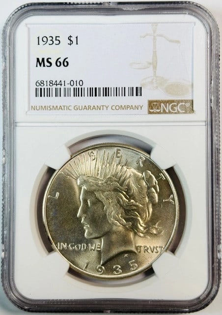 NGC MS66 1935 Silver Peace Dollar Coin United States: NGC MS66 1935 Silver Peace Dollar Coin United States This 1935 Peace Dollar is certified by NGC with a grade of MS 66. Crafted from silver, this uncirculated coin originates from the USA and carries a