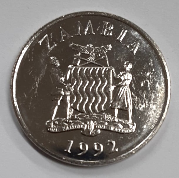 Roll of 30 Uncirculated 1992 Zambia 50 Ngwee Nickel Plated Steel Coins KM30: Roll of 30 Uncirculated 1992 Zambia 50 Ngwee Nickel Plated Steel Coins KM30 This is a roll of 30 un-used 1992 Zambia 50 Ngwee coins, each made from nickel plated steel. The coins are of type KM#30 and