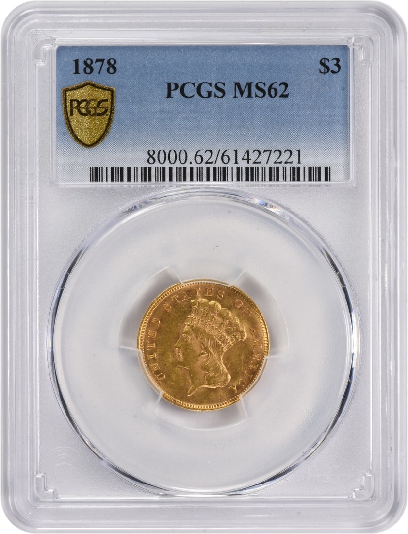 United States 1878 Three Dollar Gold Coin MS62 by PCGS: United States 1878 Three Dollar Gold Coin MS62 by PCGS This 1878 $3 gold coin from the United States was minted in Philadelphia and is graded MS62 by PCGS. Designed by James Barton Longacre, it is an