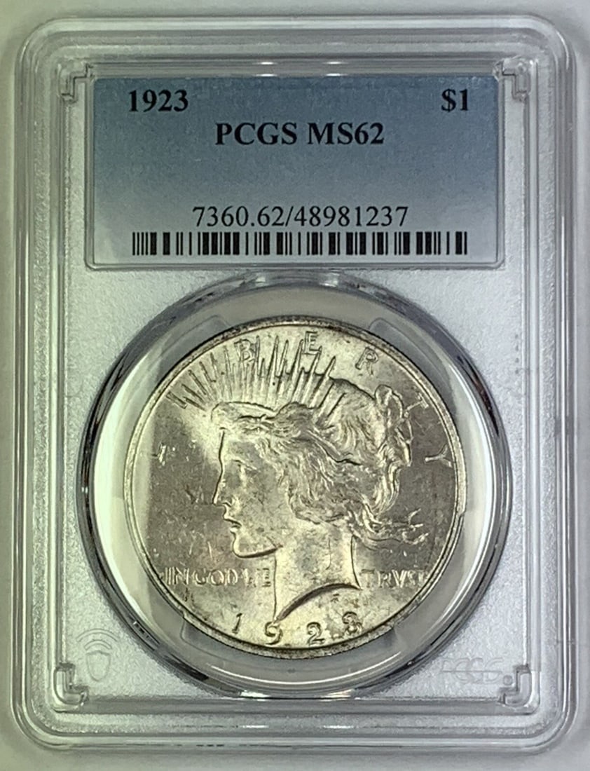 PCGS MS 62 Certified 1923 Peace Silver Dollar Coin: PCGS MS 62 Certified 1923 Peace Silver Dollar Coin This is a 1923 Peace Silver $1 Dollar Coin from the United States, certified by PCGS with a grade of MS 62. The coin is composed of silver, is uncirc