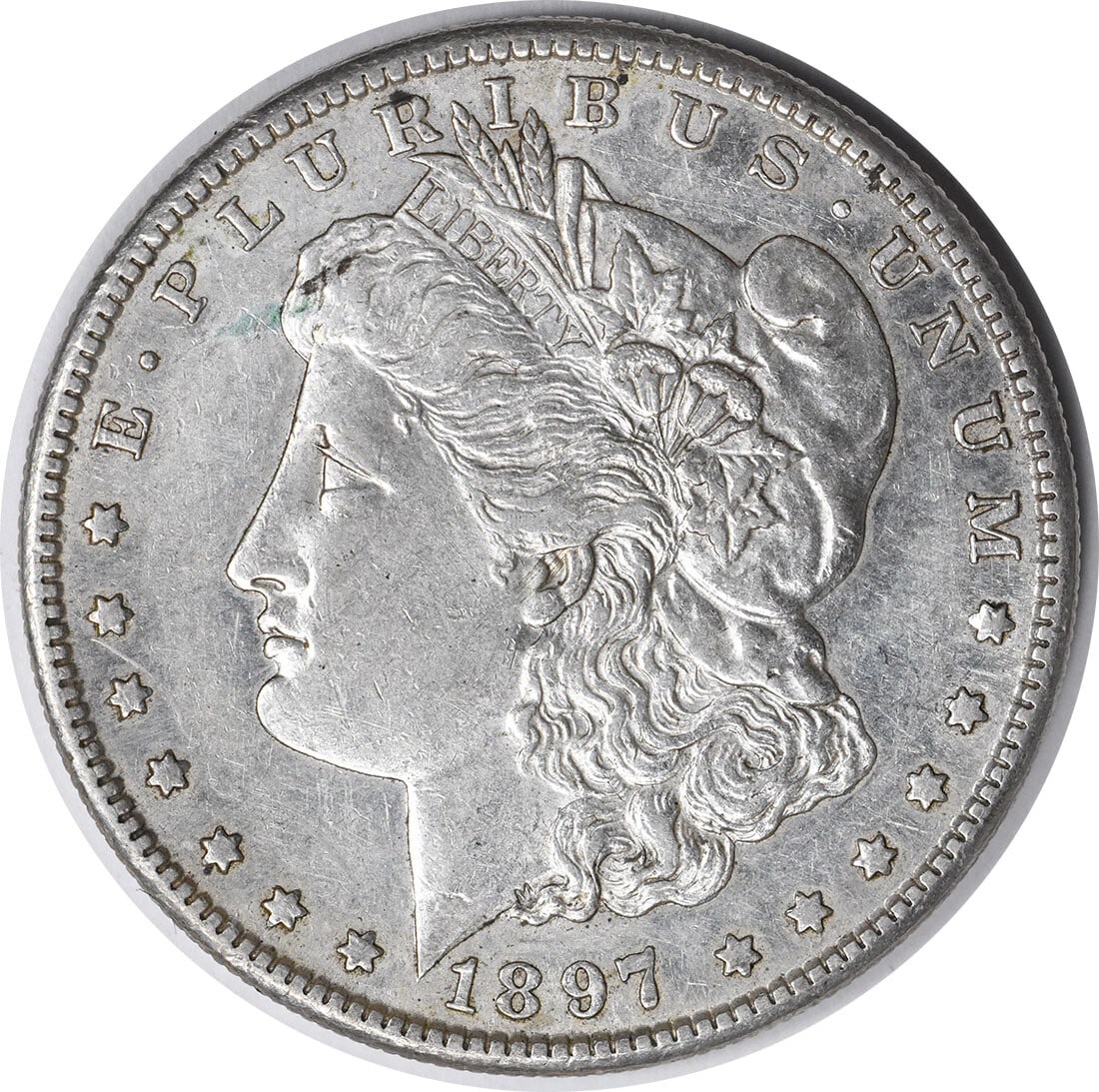 1897-S Morgan Silver Dollar AU Uncertified San Francisco Mint: 1897-S Morgan Silver Dollar AU Uncertified San Francisco Mint This 1897-S Morgan Silver Dollar showcases a beautiful design by George T. Morgan, featuring a classic representation of Lady Liberty and